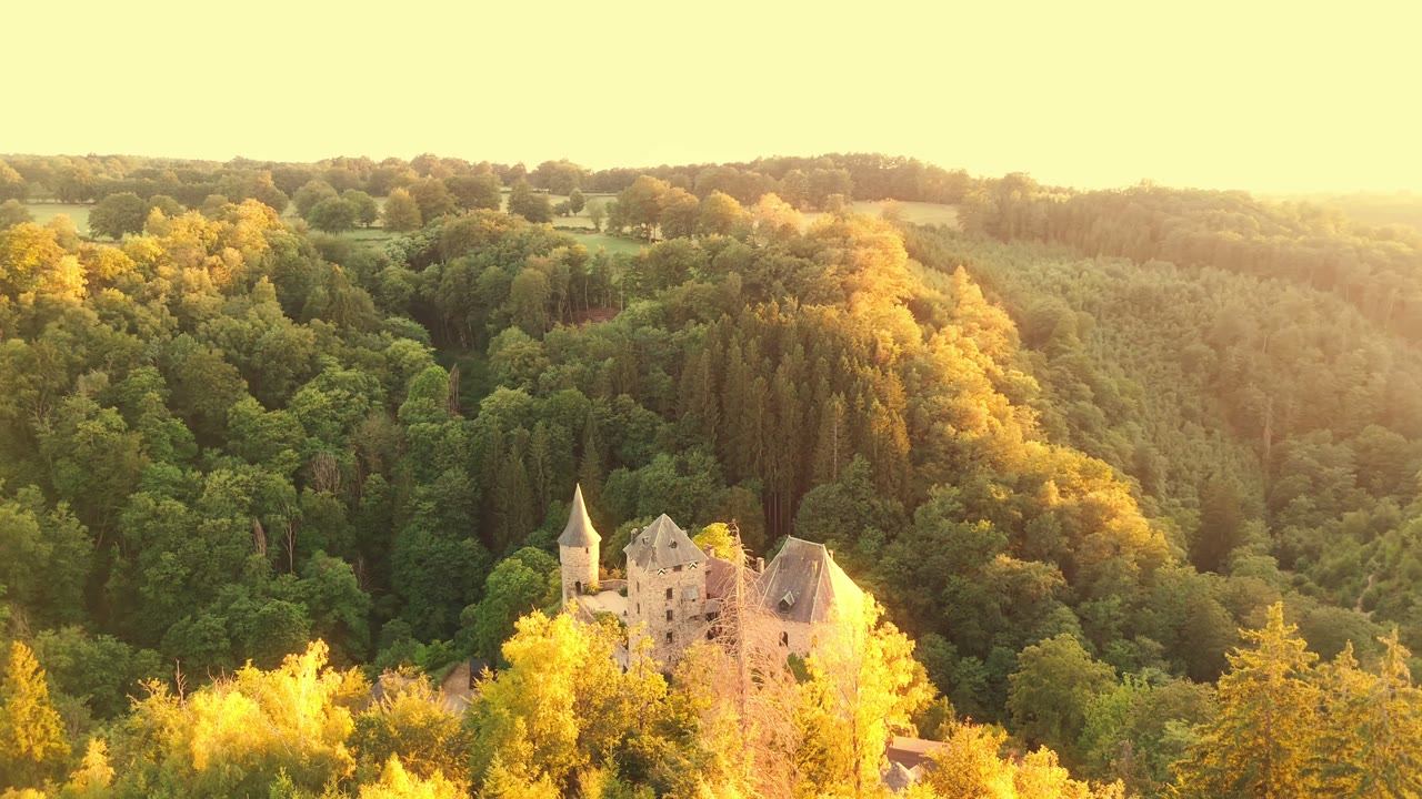 Drone shot of a building on its site, from our travel work